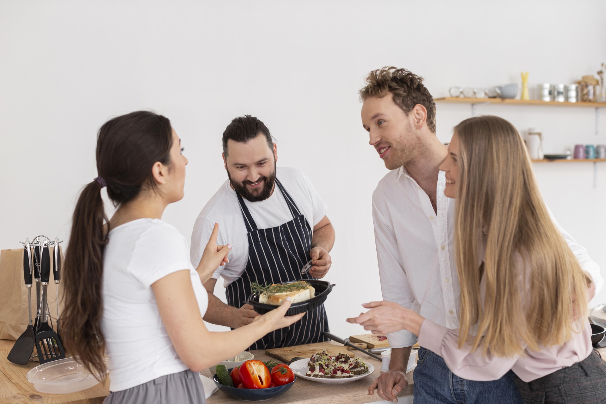 Instructor guiding a small cooking class